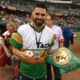 Photo of world boxing champion Jose Ramirez with his title belt