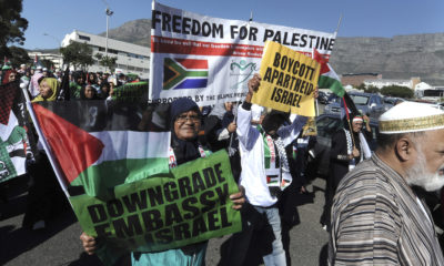 Protesters take part in a march to parliament in Cape Town, South Africa, Tuesday, May 15, 2018