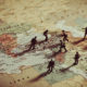 Photo Illustration of Toy Soldiers on a map of the Middle East.