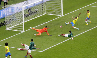 AP Photo of Neymar right before he scores against Mexico