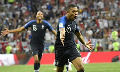 Photo of French soccer star Kylian Mbappe celebrating his goal.