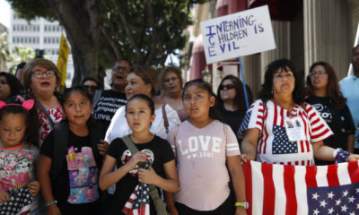 Photo of people protesting zero tolerance immigration policy