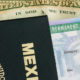 Photo of passport, green card and American money