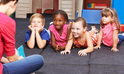 Shutterstock photo of nursery school teacher and her flock