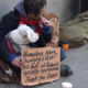 Photo of a homeless man and his dog in New York City