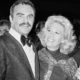 Photo of actress Dinah Shore and Burt Reynolds appear together in Los Angeles in 1971