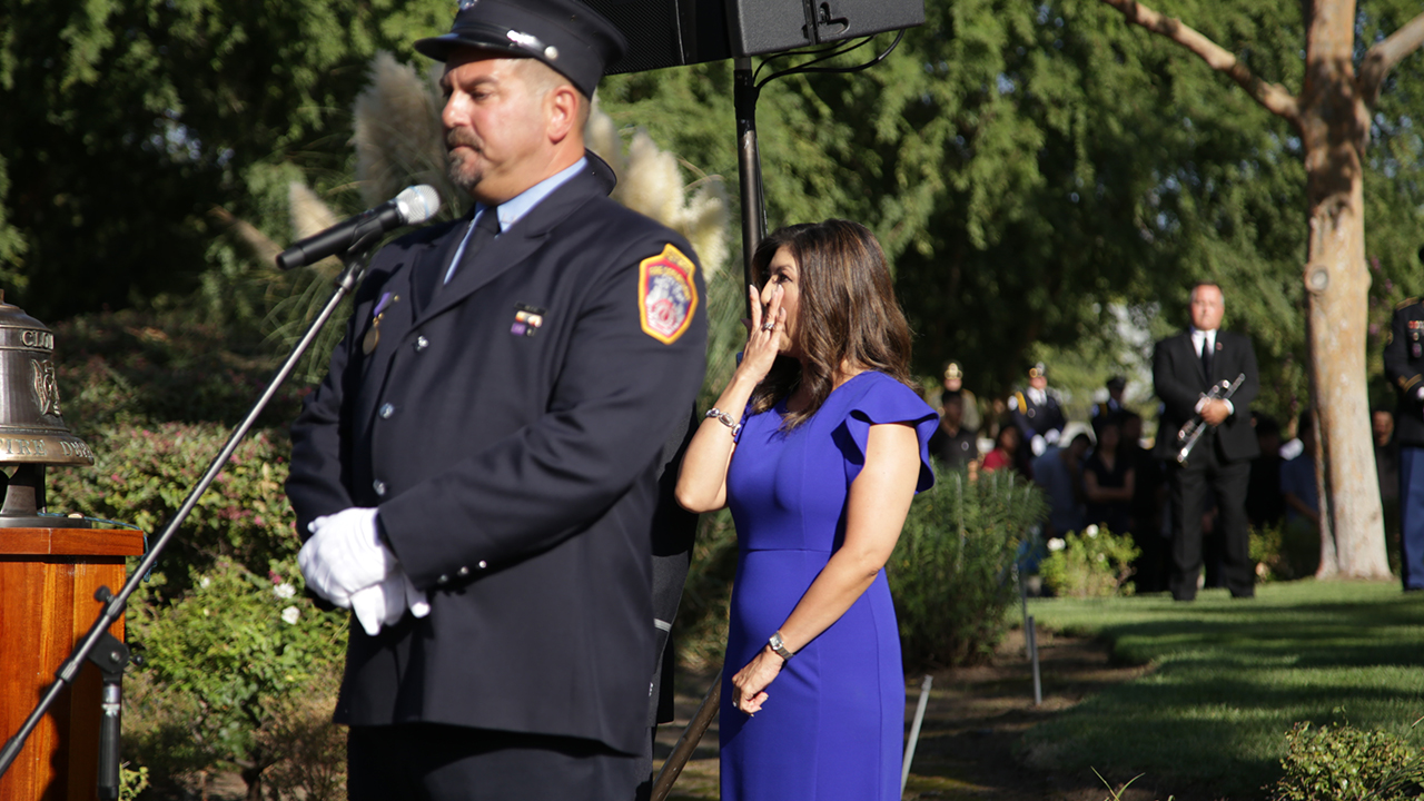 Photo of former New York City firefighter Andy Isolano and ABC 30 news anchor Margot Kim