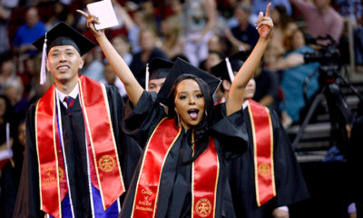 Photo of Fresno State grads celebrating