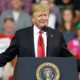 Photo of President Donald Trump speaking at a rally in Iowa