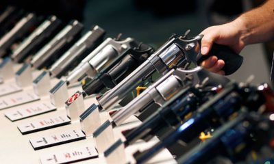 Photo of handguns displayed at the Smith & Wesson booth at the Shooting, Hunting and Outdoor Trade Show in Las Vegas