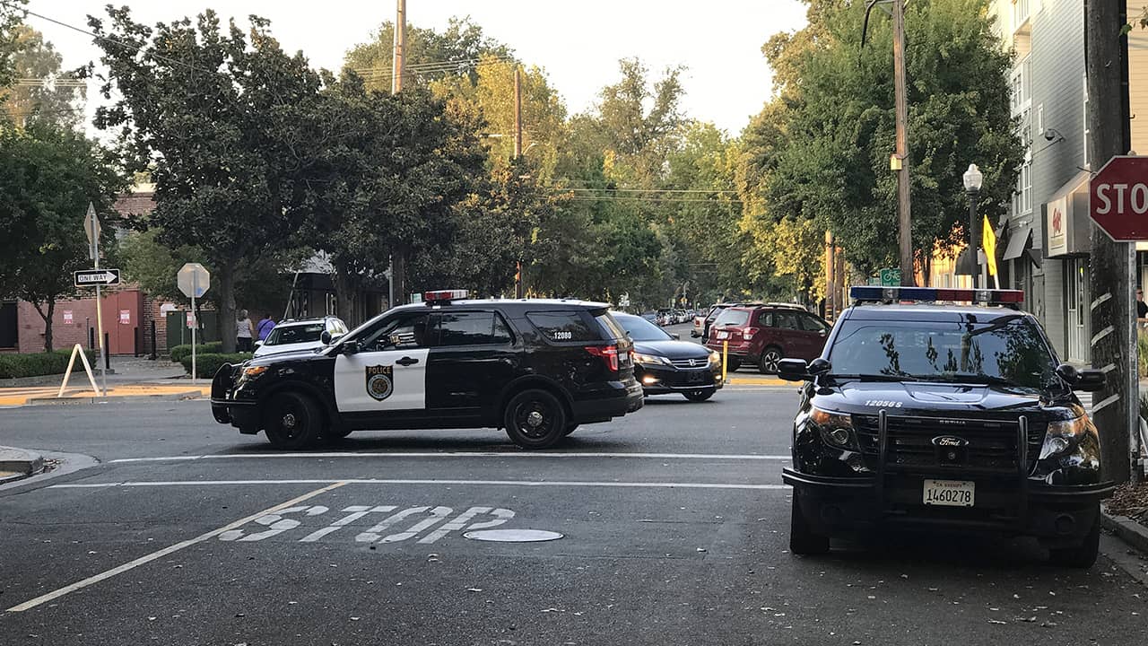 Photo of police cars parked in the street