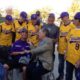 Photo of Tom Seaver with Fresno High coach Stan Papi and his players