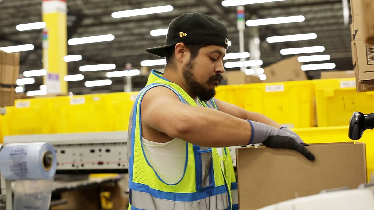 Photo of an employee at Amazon's fulfillment center in Fresno, California