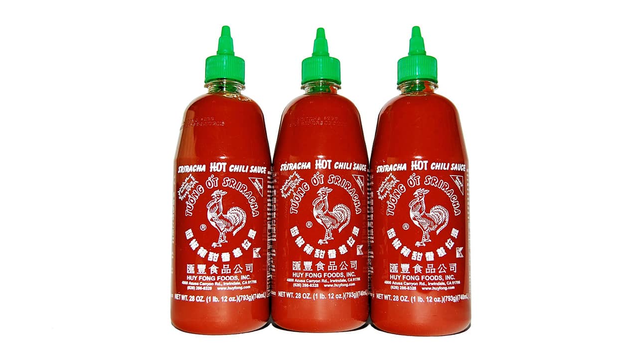 Photo of 3 bottles of Sriracha