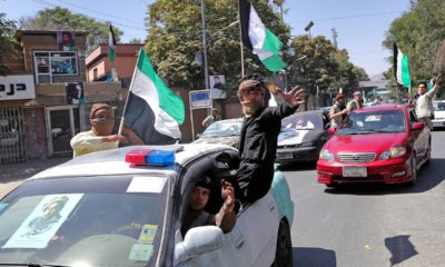 Photo of Afghans traveling in convoy in Kabul