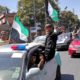 Photo of Afghans traveling in convoy in Kabul