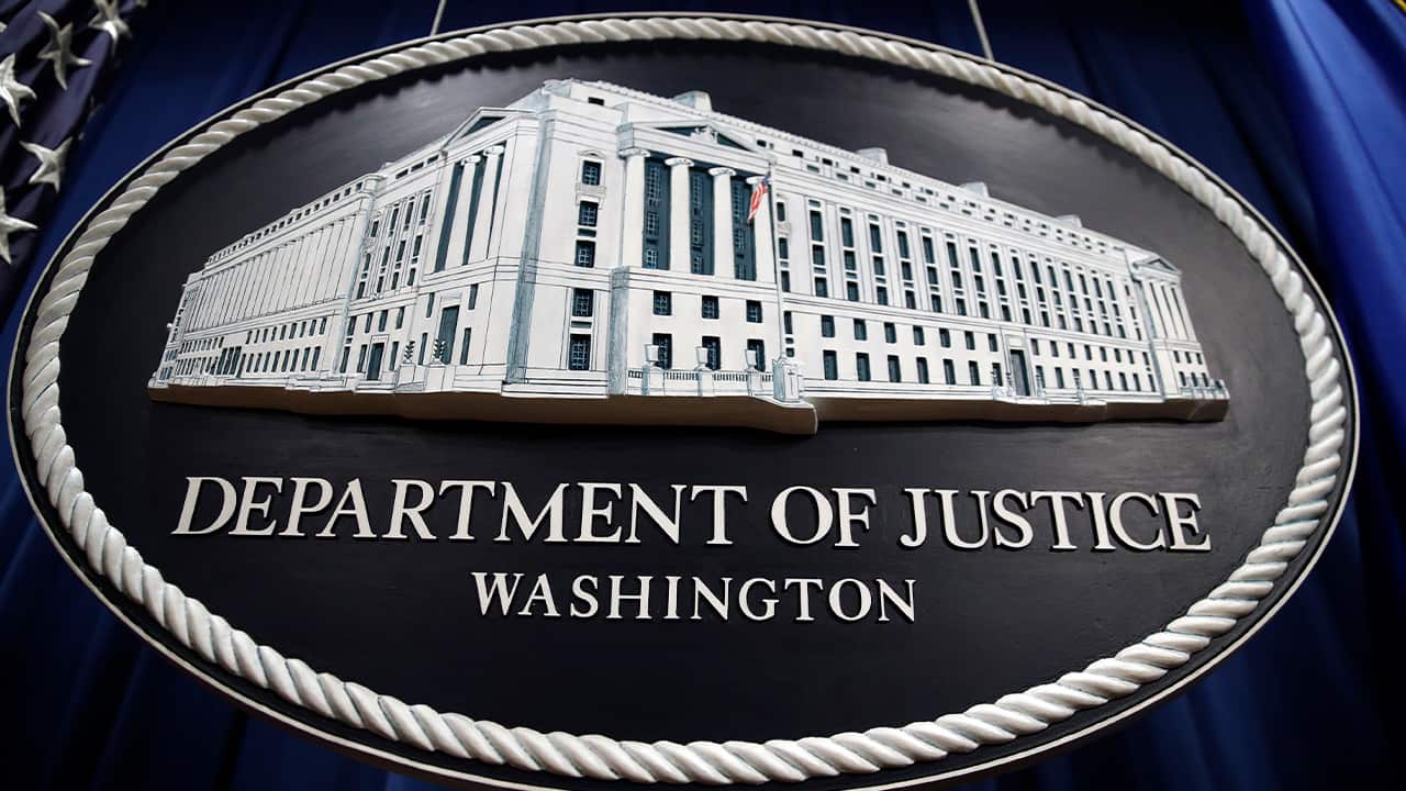 Photo of a sign for the Department of Justice