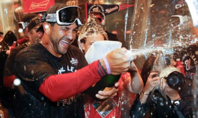 Photo of Washington Nationals manager Dave Martinez celebrating