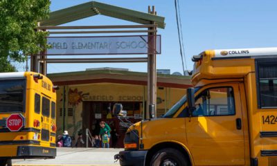 Photo of school buses outside of Garfield Elementary School in Oakland