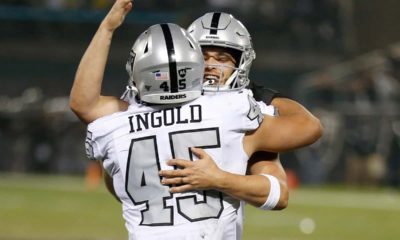 Photo of Derek Carr hugging Alec Ingold