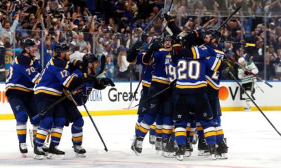 Photo of St. Louis Blues celebrating after defeating the Dallas Stars in double overtime in Game 7 of an NHL second-round hockey playoff series in St. Louis