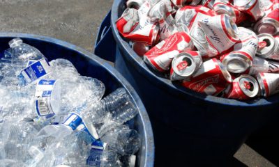 Photo of water bottles and Budweiser cans