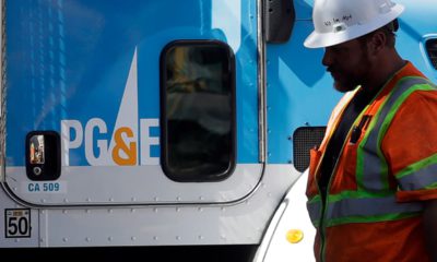 Photo of PG&E worker and truck