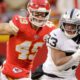 Photo of Oakland Raiders running back DeAndré Washington running away from Kansas City Chiefs safety Daniel Sorensen