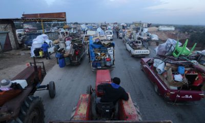 Photo of truckloads of civilians fleeing a Syrian military offensive