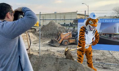 Photo of the Reedley College mascot shoveling dirt during a groundbreaking event