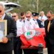 Photo of New South Wales Rural Fire Service crew members from Horsley Park RFS carrying the casket of Andrew O'Dwyer