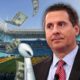 Photo illustration of Rep. Devin Nunes at the Super Bowl with money flying around him