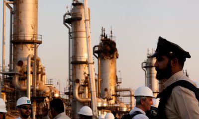 Photo of a guard in front of Aramco's oil facility