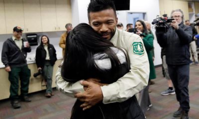 Photo of firefighter Leonard Dimaculangan hugging his daughter