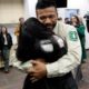 Photo of firefighter Leonard Dimaculangan hugging his daughter