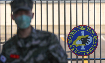 Photo of a South Korean marine wearing a mask