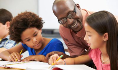 Photo of a teacher with students