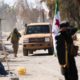 Photo of Syrian rebels entering the town of Saraqeb, in Idlib province, Syria