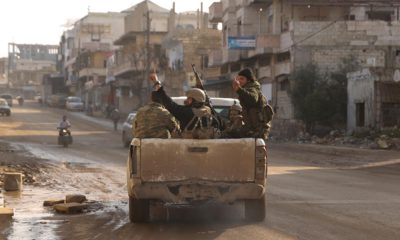 Photo of Syrian rebels driving in Nerab