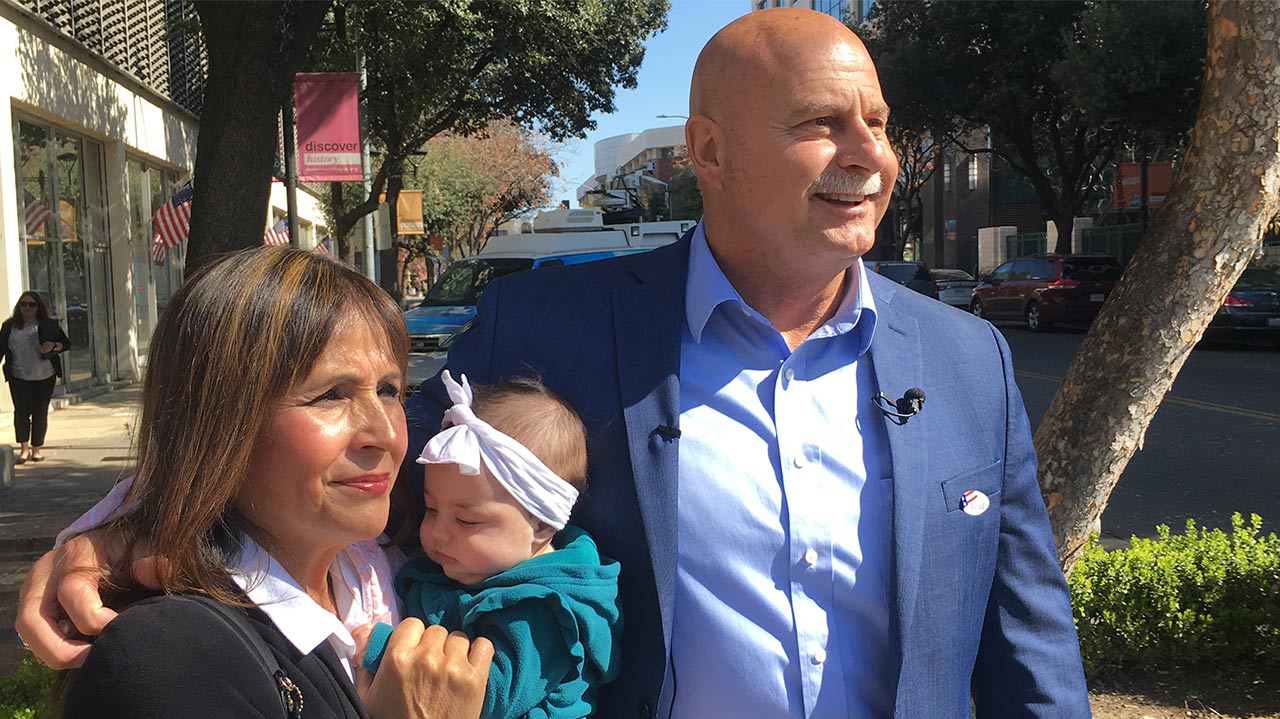 Photo of Jerry Dyer with his wife and granddaughter