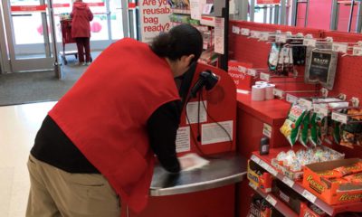 Northwest Fresno Target employee cleans register