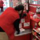 Northwest Fresno Target employee cleans register