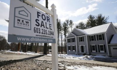 Photo of a for sale sign in front of a house in Londonderry