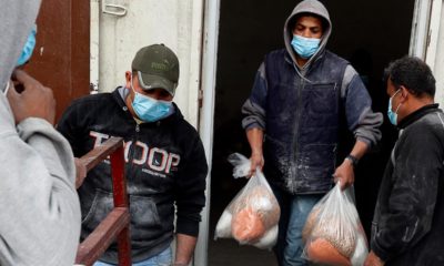 Photo of Palestinian workers delivering food