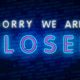 Neon "closed" sign at a bar