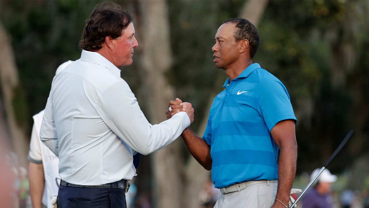 Photo of Phil Mickelson and Tiger Woods