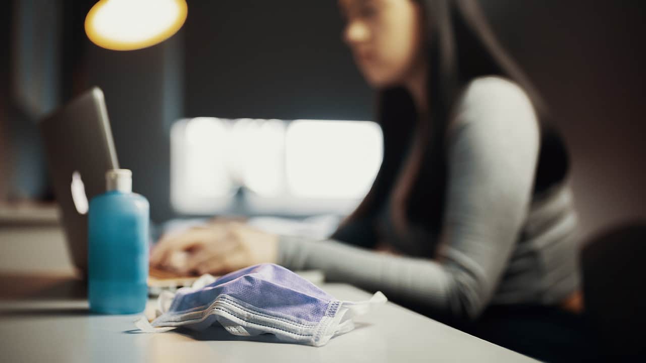 Photo of a female student doing classwork online during COVID-19