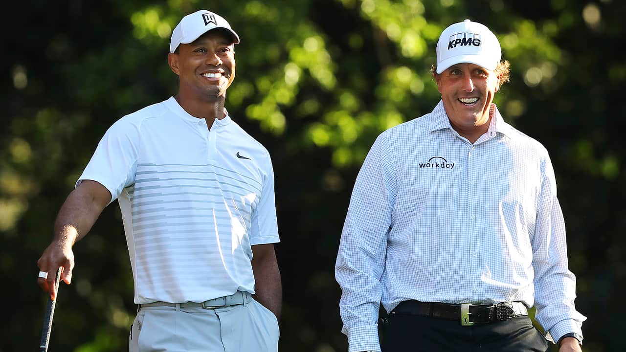 Photo of Tiger Woods, left, and Phil Mickelson