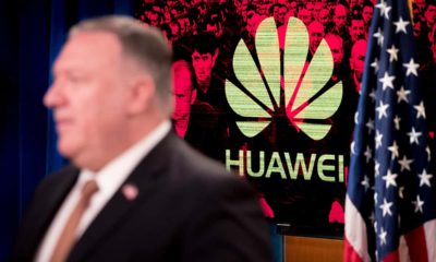 Photo of the Huawei logo and Mike Pompeo