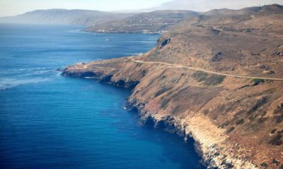 Photo of an aerial view of the coast and Pacific Ocean taken flying in to San Clemente Island